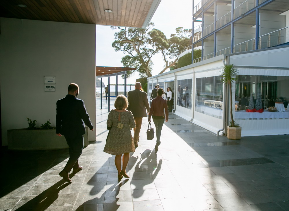 business person walking down the alley to their meeting during the sunset hour